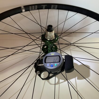 Measuring spoke tension for spokes of any length